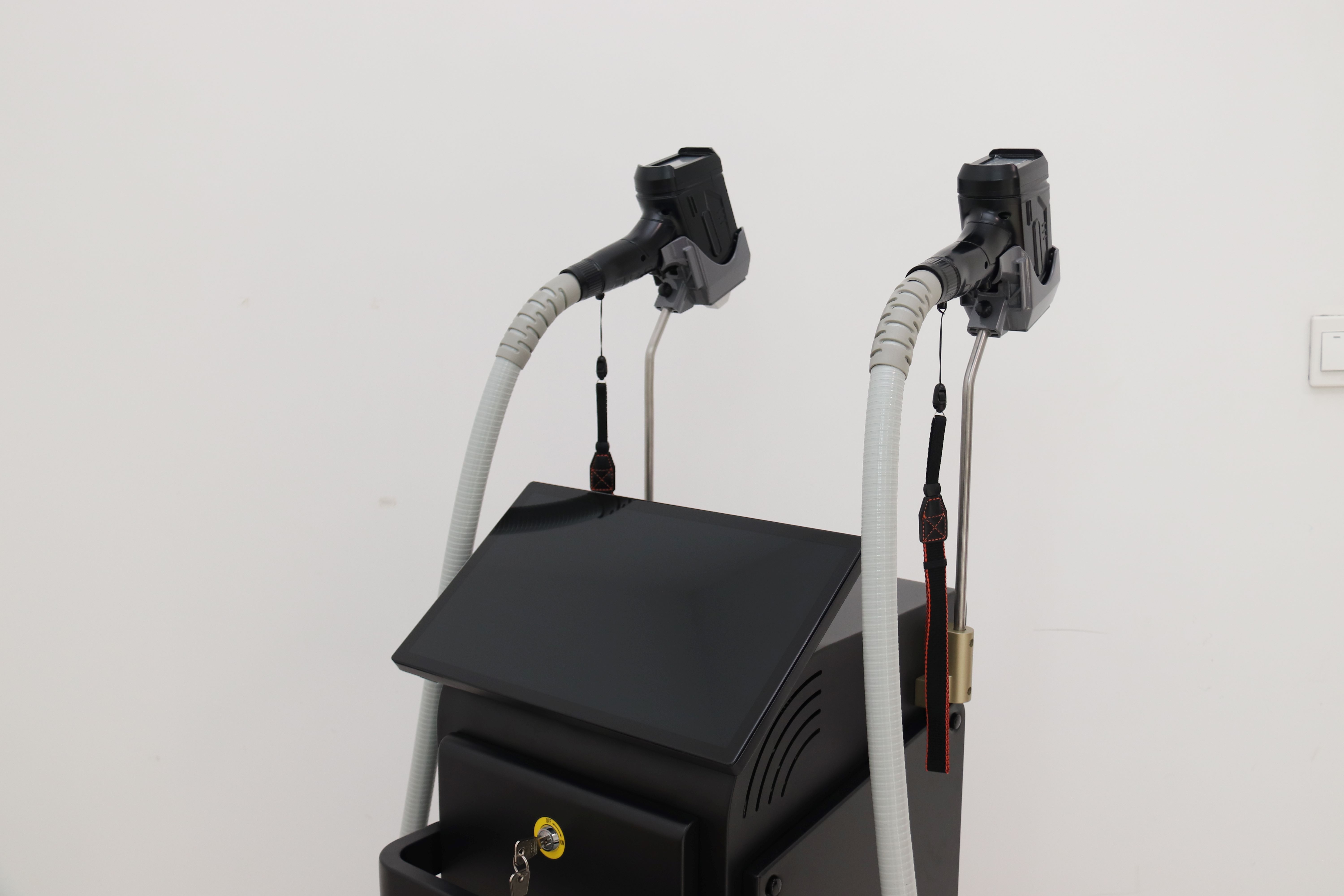 Macchina professionale per la depilazione laser a doppio manipolo